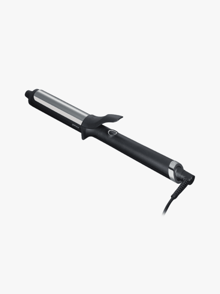 ghd Curve Soft Curl Iron in branded component on a light gray background